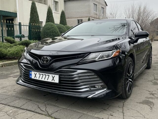 Чорний Тойота Камрі, об'ємом двигуна 2.5 л та пробігом 180 тис. км за 15999 $, фото 1 на Automoto.ua