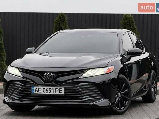 Черный Тойота Камри, объемом двигателя 2.49 л и пробегом 170 тыс. км за 17200 $, фото 1 на Automoto.ua