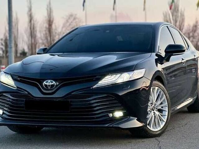Черный Тойота Камри, объемом двигателя 2.5 л и пробегом 105 тыс. км за 16200 $, фото 1 на Automoto.ua