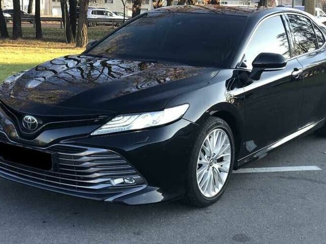 Черный Тойота Камри, объемом двигателя 2.5 л и пробегом 71 тыс. км за 15000 $, фото 1 на Automoto.ua