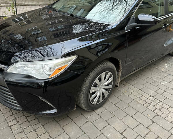 Чорний Тойота Камрі, об'ємом двигуна 2.49 л та пробігом 69 тис. км за 15500 $, фото 1 на Automoto.ua