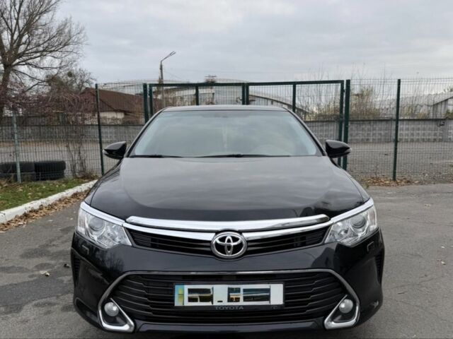 Черный Тойота Камри, объемом двигателя 2.5 л и пробегом 133 тыс. км за 18700 $, фото 1 на Automoto.ua