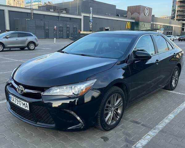 Чорний Тойота Камрі, об'ємом двигуна 2.5 л та пробігом 214 тис. км за 14300 $, фото 1 на Automoto.ua