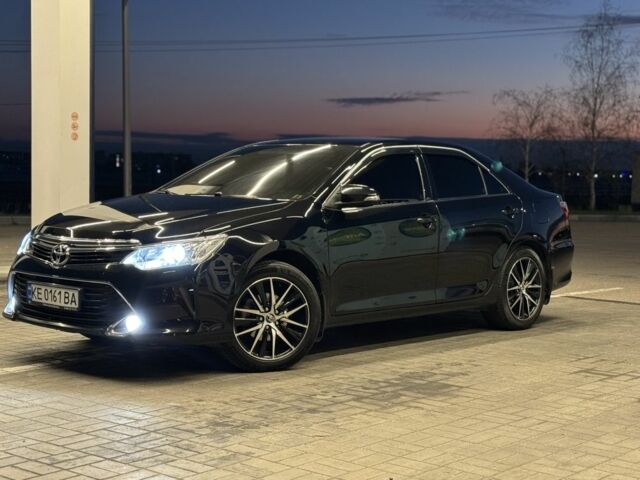 Черный Тойота Камри, объемом двигателя 2.5 л и пробегом 210 тыс. км за 18300 $, фото 1 на Automoto.ua