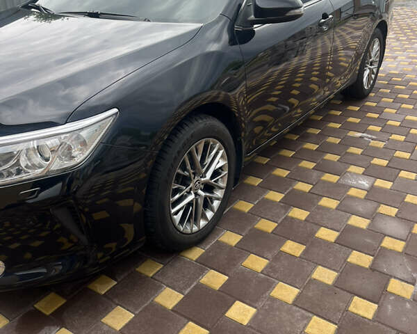 Черный Тойота Камри, объемом двигателя 2.5 л и пробегом 212 тыс. км за 16500 $, фото 1 на Automoto.ua