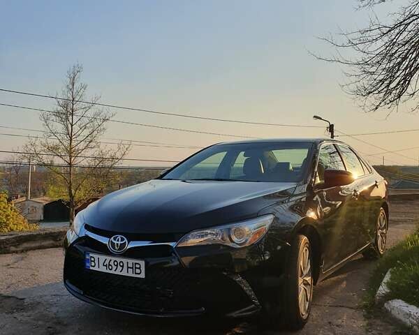 Чорний Тойота Камрі, об'ємом двигуна 2.49 л та пробігом 75 тис. км за 16800 $, фото 1 на Automoto.ua