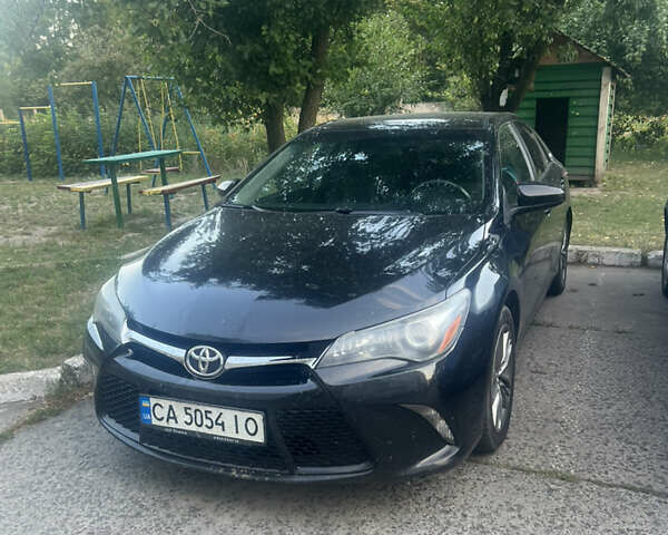 Чорний Тойота Камрі, об'ємом двигуна 2.49 л та пробігом 220 тис. км за 14000 $, фото 1 на Automoto.ua