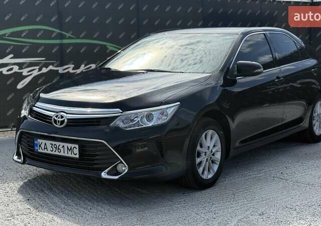 Черный Тойота Камри, объемом двигателя 2.49 л и пробегом 105 тыс. км за 17000 $, фото 1 на Automoto.ua