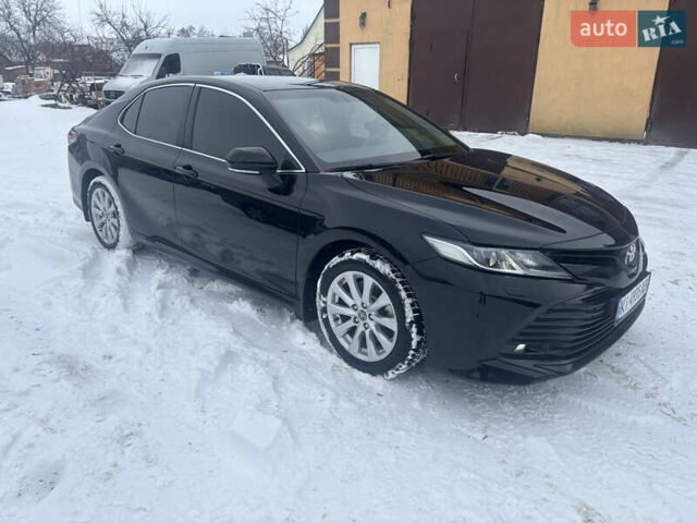 Черный Тойота Камри, объемом двигателя 2.49 л и пробегом 150 тыс. км за 19500 $, фото 1 на Automoto.ua