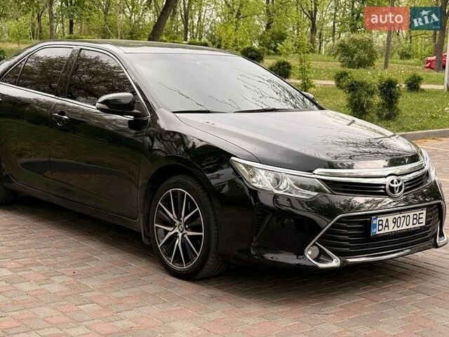 Черный Тойота Камри, объемом двигателя 2.49 л и пробегом 217 тыс. км за 17900 $, фото 1 на Automoto.ua