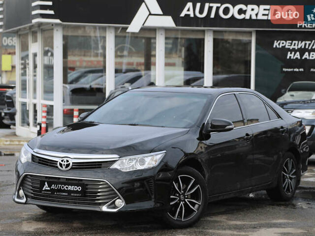 Черный Тойота Камри, объемом двигателя 2.49 л и пробегом 112 тыс. км за 22000 $, фото 1 на Automoto.ua