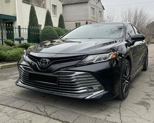 Чорний Тойота Камрі, об'ємом двигуна 2.49 л та пробігом 180 тис. км за 15999 $, фото 1 на Automoto.ua