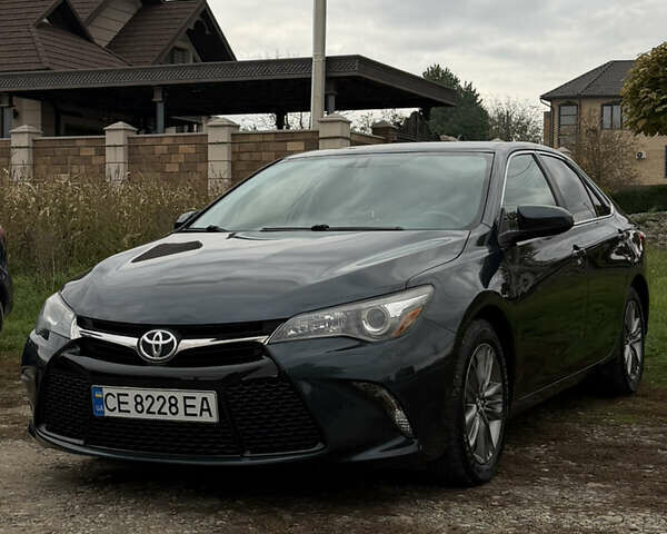 Чорний Тойота Камрі, об'ємом двигуна 2.49 л та пробігом 176 тис. км за 14500 $, фото 1 на Automoto.ua