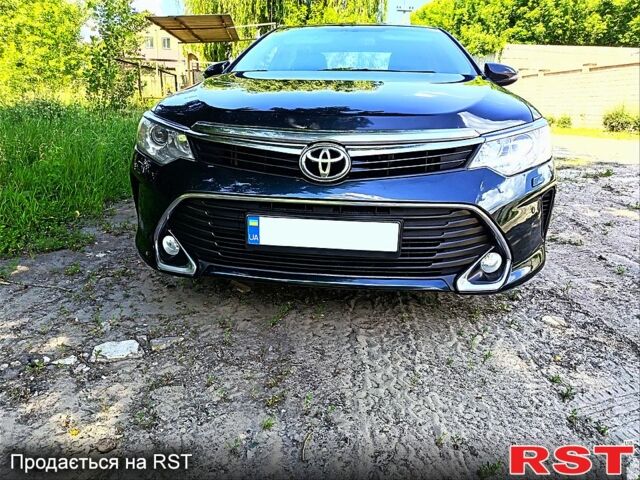 Черный Тойота Камри, объемом двигателя 2.5 л и пробегом 264 тыс. км за 16200 $, фото 1 на Automoto.ua