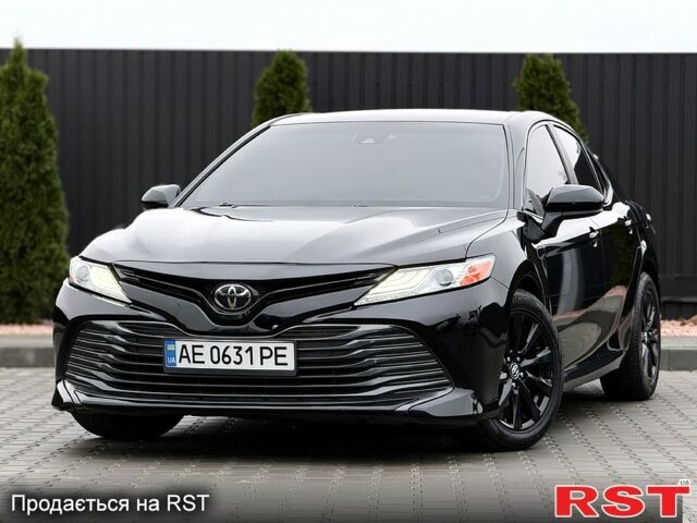 Черный Тойота Камри, объемом двигателя 2.5 л и пробегом 170 тыс. км за 19999 $, фото 1 на Automoto.ua