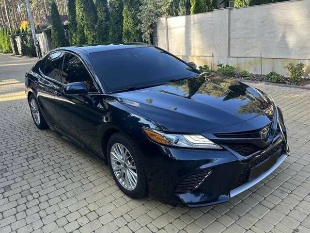 Черный Тойота Камри, объемом двигателя 2.5 л и пробегом 125 тыс. км за 15600 $, фото 1 на Automoto.ua