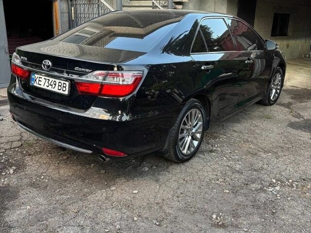 Черный Тойота Камри, объемом двигателя 2.5 л и пробегом 176 тыс. км за 16500 $, фото 1 на Automoto.ua