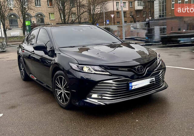 Черный Тойота Камри, объемом двигателя 2.5 л и пробегом 77 тыс. км за 25600 $, фото 1 на Automoto.ua