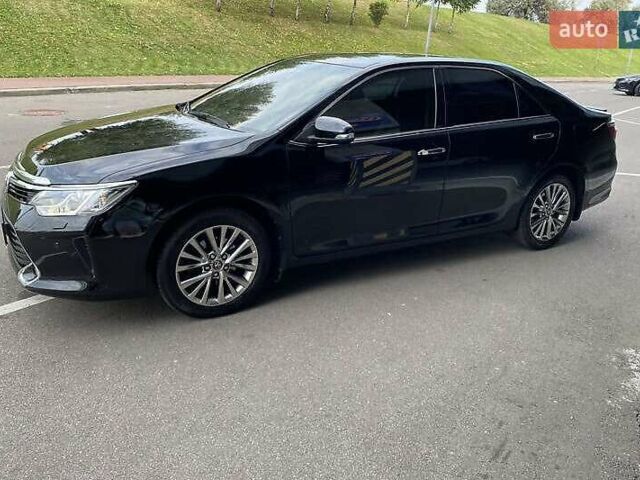Чорний Тойота Камрі, об'ємом двигуна 2.49 л та пробігом 135 тис. км за 16400 $, фото 1 на Automoto.ua