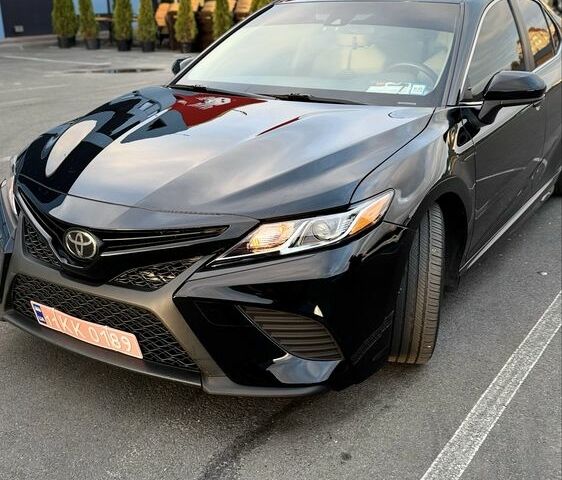 Черный Тойота Камри, объемом двигателя 2.5 л и пробегом 150 тыс. км за 19300 $, фото 1 на Automoto.ua