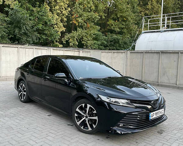 Черный Тойота Камри, объемом двигателя 2.49 л и пробегом 123 тыс. км за 20000 $, фото 1 на Automoto.ua