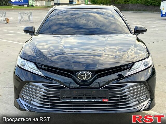 Черный Тойота Камри, объемом двигателя 2.5 л и пробегом 199 тыс. км за 22900 $, фото 1 на Automoto.ua