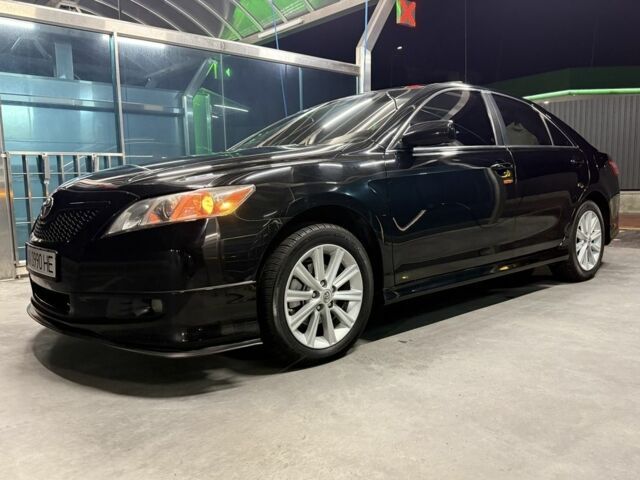 Черный Тойота Камри, объемом двигателя 2.4 л и пробегом 251 тыс. км за 11990 $, фото 1 на Automoto.ua