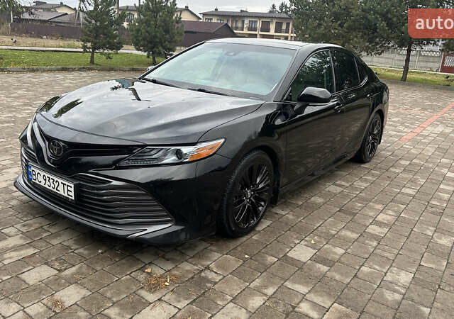 Черный Тойота Камри, объемом двигателя 2.49 л и пробегом 152 тыс. км за 20500 $, фото 1 на Automoto.ua