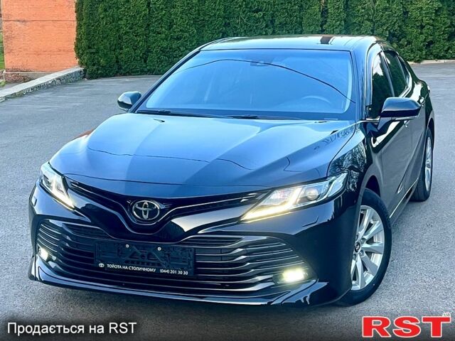 Чорний Тойота Камрі, об'ємом двигуна 2.5 л та пробігом 63 тис. км за 23100 $, фото 1 на Automoto.ua