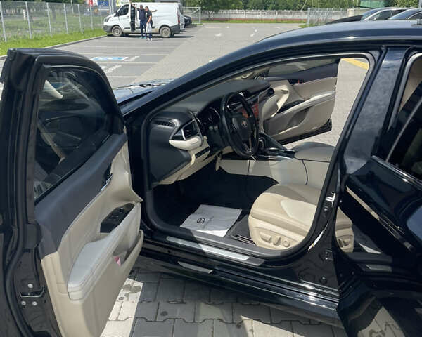 Чорний Тойота Камрі, об'ємом двигуна 2.49 л та пробігом 107 тис. км за 27000 $, фото 1 на Automoto.ua