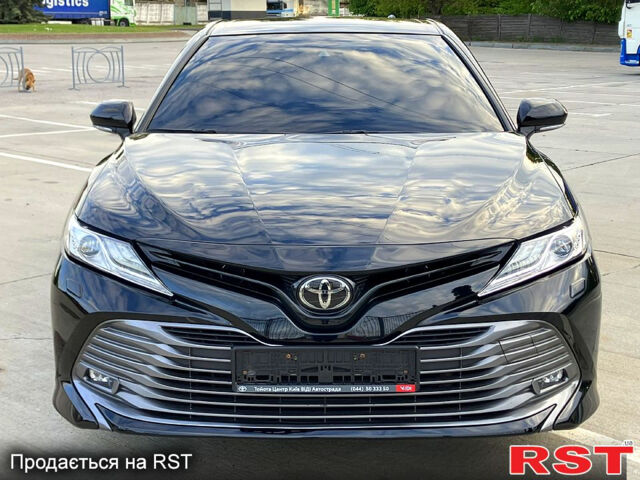 Чорний Тойота Камрі, об'ємом двигуна 2.5 л та пробігом 199 тис. км за 22500 $, фото 1 на Automoto.ua