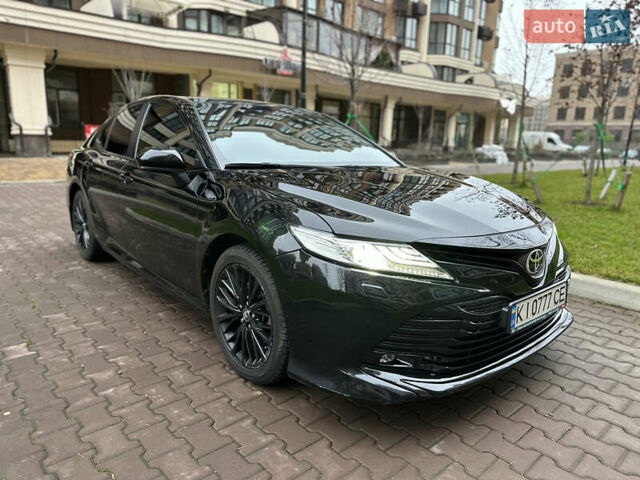 Чорний Тойота Камрі, об'ємом двигуна 2.49 л та пробігом 77 тис. км за 24550 $, фото 1 на Automoto.ua