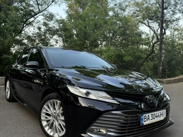 Черный Тойота Камри, объемом двигателя 2.5 л и пробегом 129 тыс. км за 25499 $, фото 1 на Automoto.ua