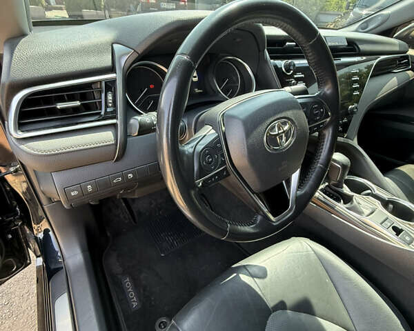 Черный Тойота Камри, объемом двигателя 2.4 л и пробегом 155 тыс. км за 23999 $, фото 1 на Automoto.ua