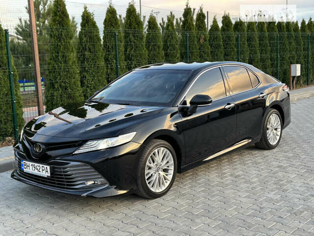 Черный Тойота Камри, объемом двигателя 2.49 л и пробегом 76 тыс. км за 28700 $, фото 1 на Automoto.ua