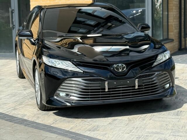 Черный Тойота Камри, объемом двигателя 2.5 л и пробегом 100 тыс. км за 23000 $, фото 1 на Automoto.ua