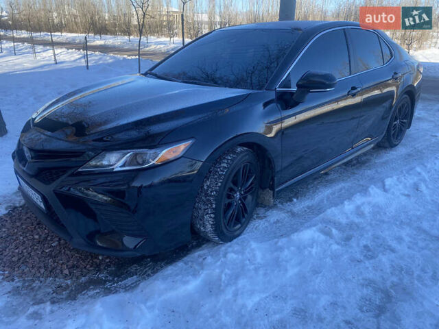 Черный Тойота Камри, объемом двигателя 2.5 л и пробегом 140 тыс. км за 18500 $, фото 1 на Automoto.ua