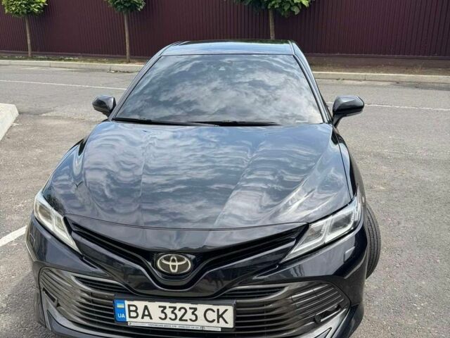 Черный Тойота Камри, объемом двигателя 2.49 л и пробегом 165 тыс. км за 19500 $, фото 1 на Automoto.ua