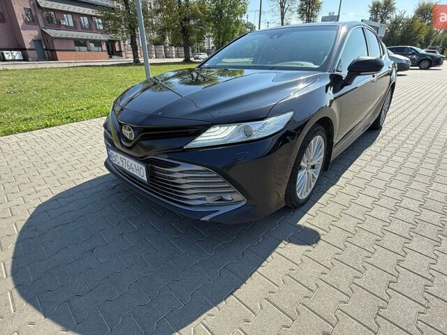 Чорний Тойота Камрі, об'ємом двигуна 2.49 л та пробігом 255 тис. км за 20500 $, фото 1 на Automoto.ua