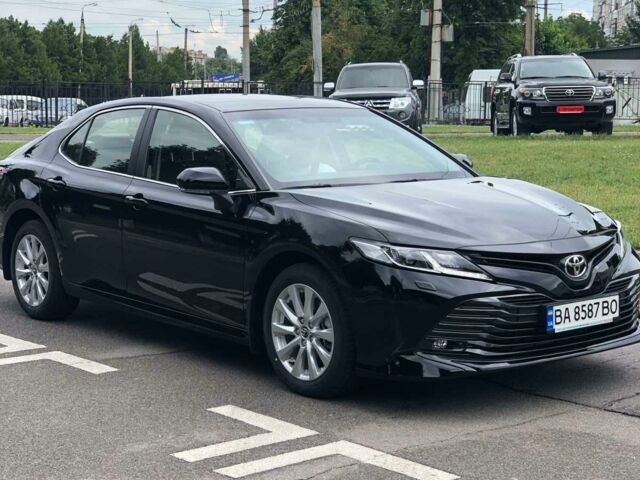 Черный Тойота Камри, объемом двигателя 2.5 л и пробегом 98 тыс. км за 23900 $, фото 1 на Automoto.ua