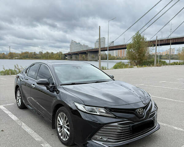 Черный Тойота Камри, объемом двигателя 2.49 л и пробегом 180 тыс. км за 22000 $, фото 1 на Automoto.ua