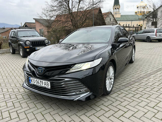 Черный Тойота Камри, объемом двигателя 2.49 л и пробегом 107 тыс. км за 32300 $, фото 1 на Automoto.ua