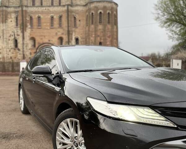 Чорний Тойота Камрі, об'ємом двигуна 2.49 л та пробігом 330 тис. км за 24500 $, фото 1 на Automoto.ua