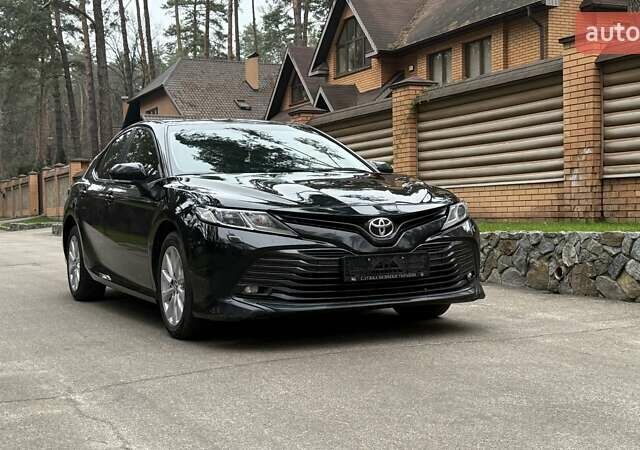 Черный Тойота Камри, объемом двигателя 2.49 л и пробегом 80 тыс. км за 22500 $, фото 1 на Automoto.ua