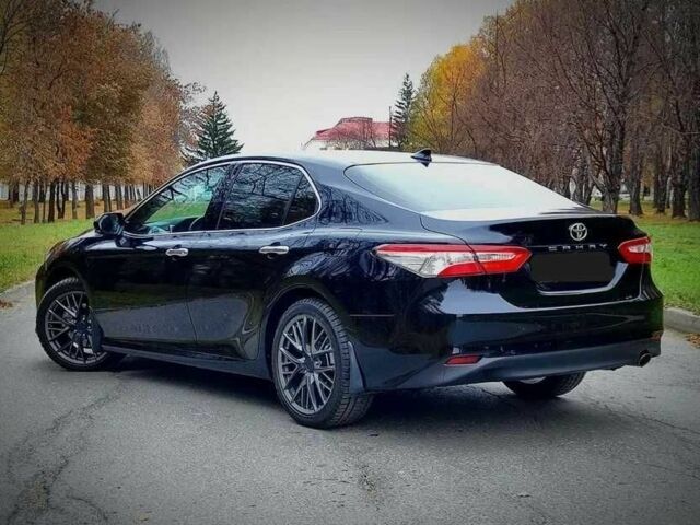 Черный Тойота Камри, объемом двигателя 2.5 л и пробегом 85 тыс. км за 21000 $, фото 1 на Automoto.ua