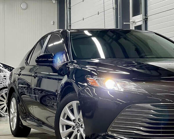 Черный Тойота Камри, объемом двигателя 2.49 л и пробегом 120 тыс. км за 21500 $, фото 1 на Automoto.ua