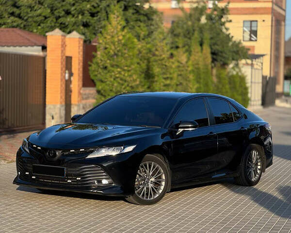 Чорний Тойота Камрі, об'ємом двигуна 2.49 л та пробігом 155 тис. км за 25500 $, фото 1 на Automoto.ua