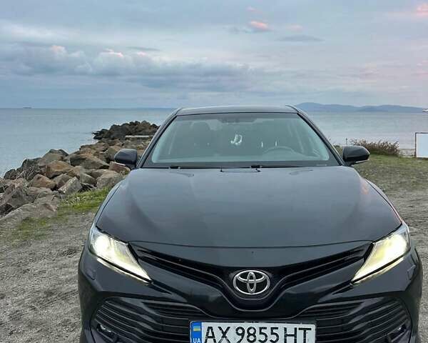 Черный Тойота Камри, объемом двигателя 2.49 л и пробегом 268 тыс. км за 17500 $, фото 1 на Automoto.ua