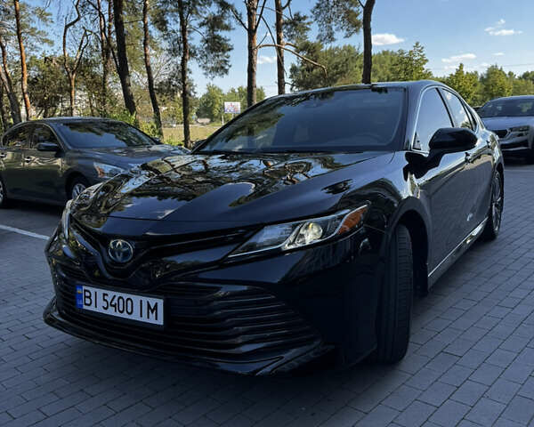 Черный Тойота Камри, объемом двигателя 2.49 л и пробегом 135 тыс. км за 23000 $, фото 1 на Automoto.ua