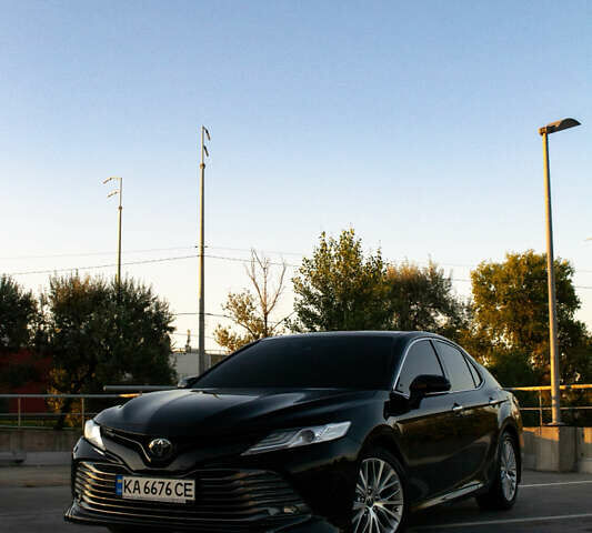 Чорний Тойота Камрі, об'ємом двигуна 2.5 л та пробігом 73 тис. км за 31900 $, фото 1 на Automoto.ua